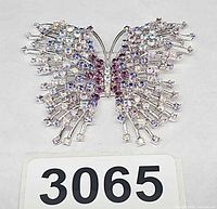 Front view of rhinestone butterfly brooch