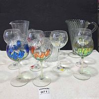 Group showing both pitchers, ice bucket and tulip wine glasses