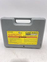 Closed grey carrying case with yellow Chicago Electric label