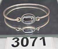 Top view showing full bracelet and black stone