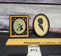 Both miniature framed portraits with ruler for scale