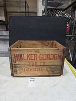 Front panel showing Walker-Gordon Lab Co Plainsboro NJ red lettering, overall crate form