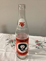 Front view showing RC salutes logo and Steelers helmet graphic on bottle