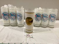 All seven Toronto Blue Jays glasses lined up, logos visible