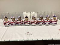 All eight 1984 Montreal Expos drinking glasses lined up showing player images and names