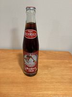 Front view of sealed 10oz Red Rock Cola Babe Ruth anniversary bottle