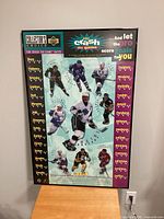 Overall view of framed You Crash The Game promotional poster