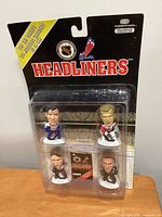 Front view of sealed 1998 Corinthian NHL Goalies Headliners blister pack showing all four figurines