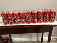 Front view showing all nine Red Wings player cans