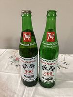 Front view of both 7Up Indianapolis 500 bottles showing graphics and capacities