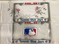 Both metal Toronto Blue Jays license plate frames front view