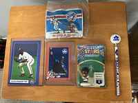 Front view of all five memorabilia items on table