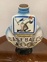 Front view showing batter graphic, raised lettering, cork