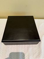 Top view of closed black Centurion Card presentation box