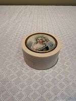 Angled view showing ivory box and portrait lid