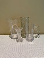 Front view showing all five assorted glass vases