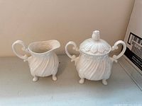 Creamer and sugar bowl front view