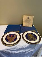 Both plates side by side with bags and COA visible