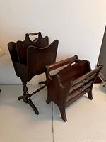 Both magazine racks, pedestal model in back, three-slot model in front