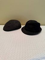 Overall view of both hats on table