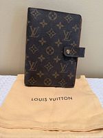 Front view of agenda cover on dust bag