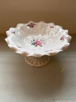 Top angle showing interior floral pattern and ruffled rim