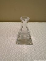 Front view showing stepped pyramid form