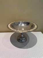 Front angled view showing bowl on pedestal base