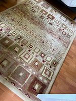 Full view of rectangular rug on hardwood floor