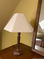 Full view of lamp showing base and hexagonal shade