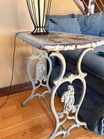 Full view of side table next to sofa