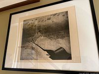 Full view of framed sepia watercolour artwork