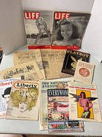 Group shot of all nine publications