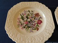 Square scalloped plate with multicolour floral bouquet centre