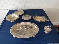 Group shot of all five serving pieces on table