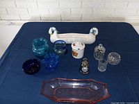 Group shot of all porcelain, crystal and glass items on table