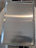 Top view of a full-size aluminum baking sheet pan