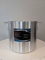 Front view of Sagetra aluminum stock pot with label