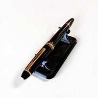 Montblanc fountain pen on stand, angled view showing clip and trim