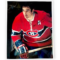 Front view of signed Frank Mahovlich photo showing full autograph and uniform details