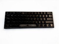 Top view of Corsair K65 RGB Mini keyboard showing 60 % layout and keycaps