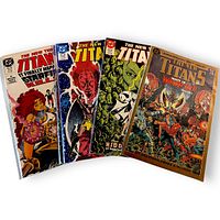 All four The New Teen Titans comic books fanned out to show covers and condition