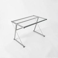 Full view of glass computer desk front angle