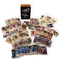 Spread of hockey cards and Upper Deck tin