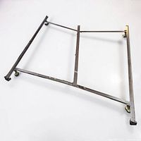 Overhead view of adjustable metal king bed frame with casters