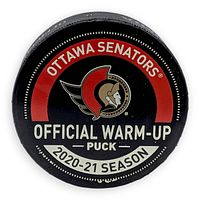 Front view of puck showing Ottawa Senators logo and 2020-21 season marking