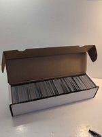 Open 800-count card box filled with MTG cards