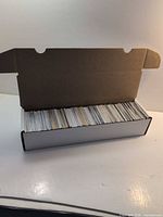Open 800-count long box filled with sports cards
