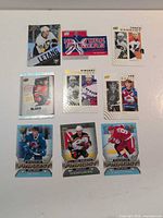 All nine hockey cards laid out in three-by-three grid