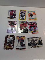 All nine hockey cards laid out together